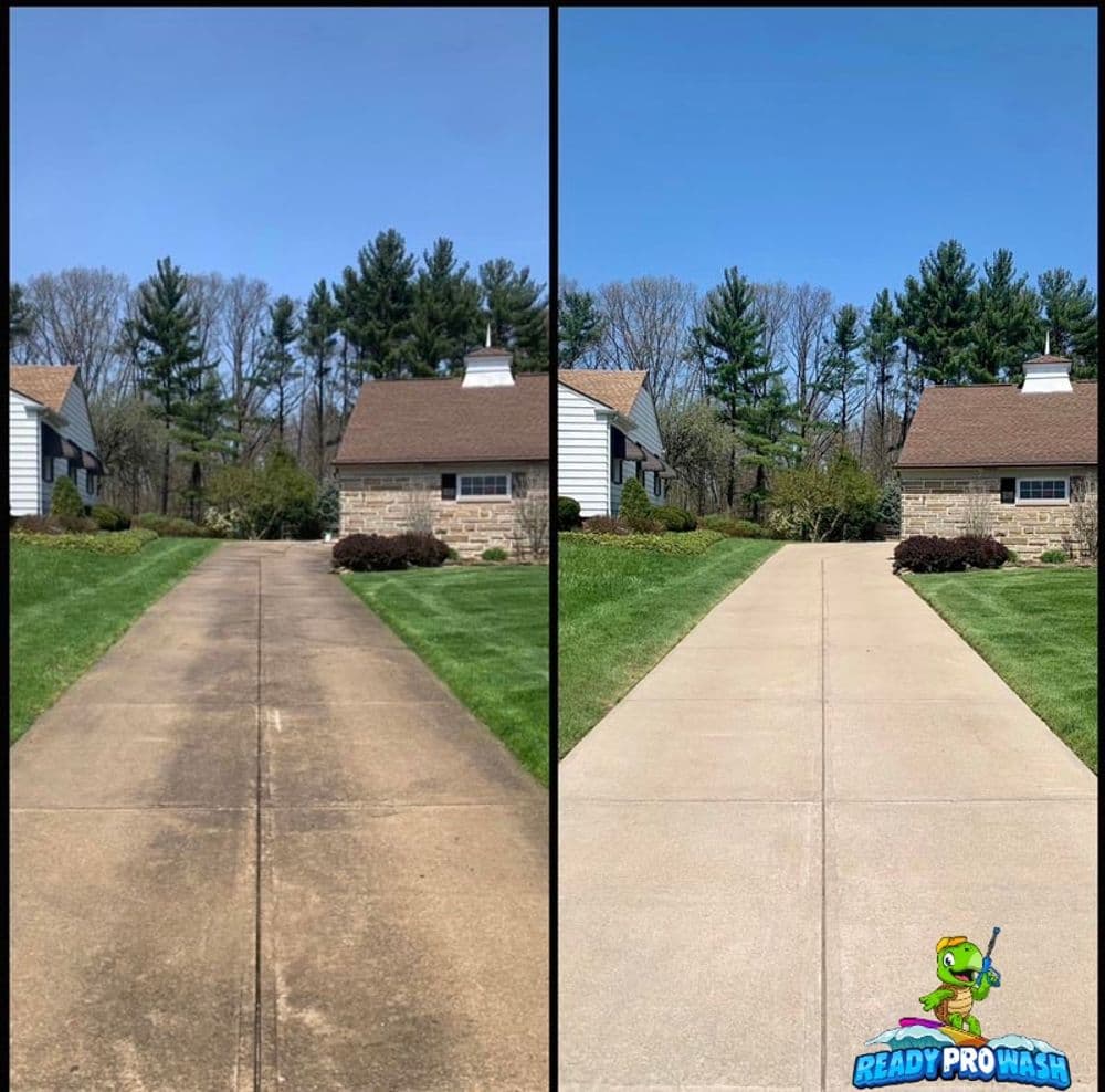 Before and after concrete driveway cleaning showing significant improvement and clarity.