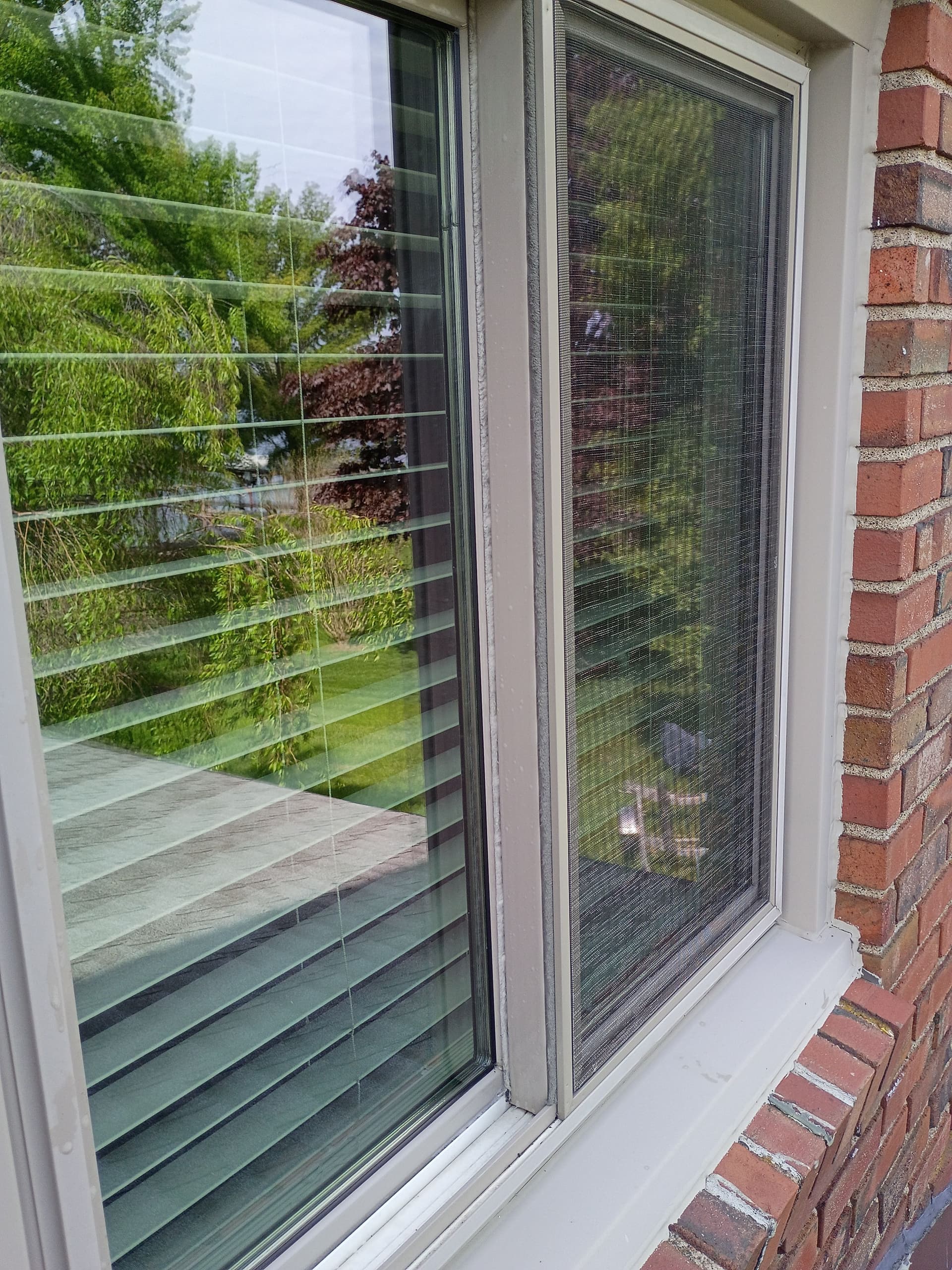 Gallery photos for Sparkling Windows on a Stunning Brick Home: Image #1